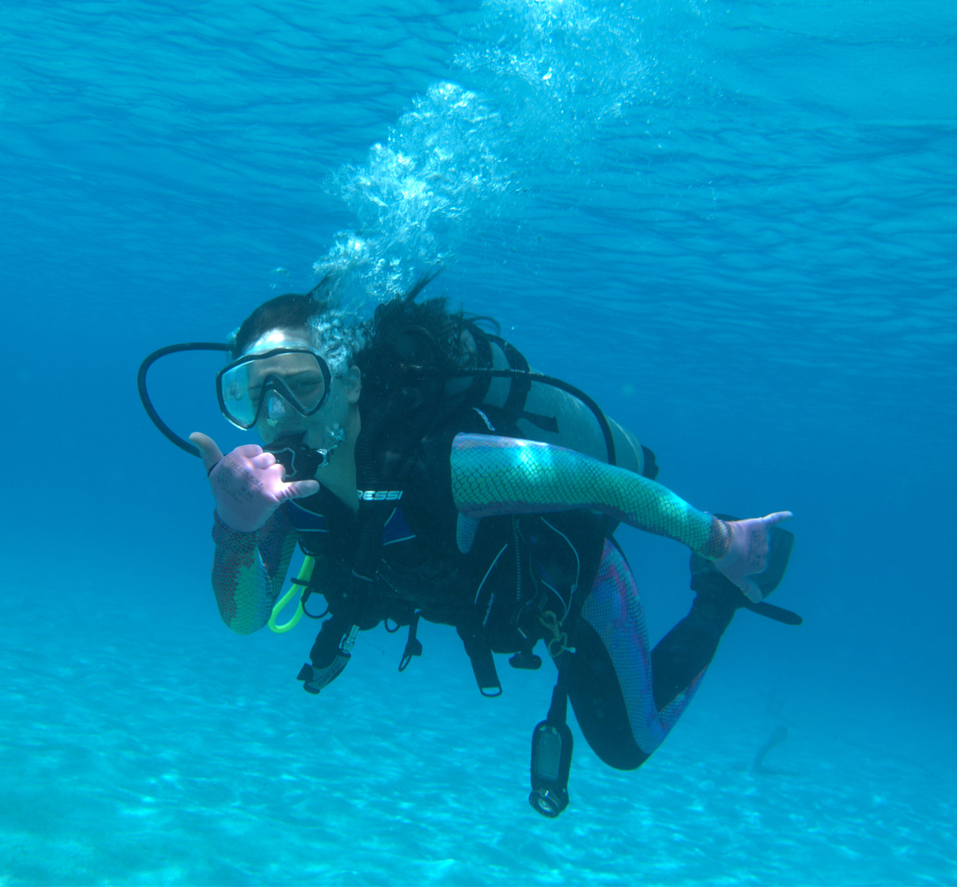 Adriana diving underwater